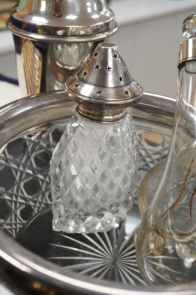 A silver christening mug, Birmingham, together with three cased sets, silver rimmed cut glass bowl, plated cocktail shaker etc